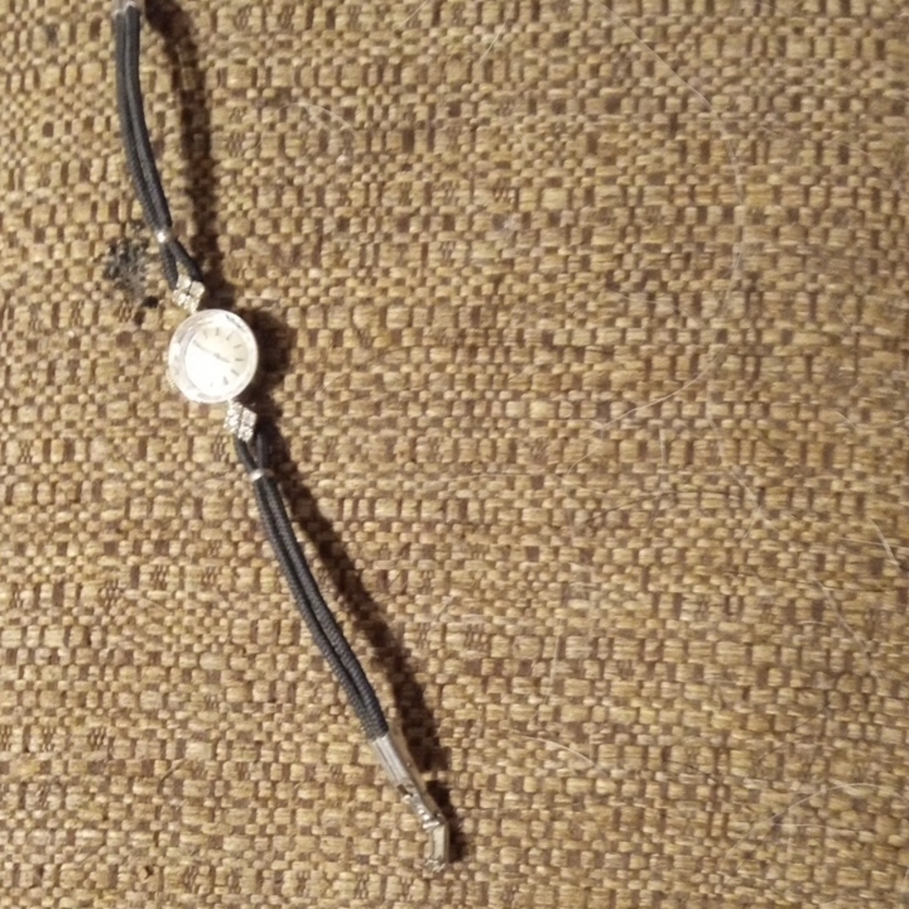 Universal Geneva. Elegant 14K Black and Silver Women's Watch
